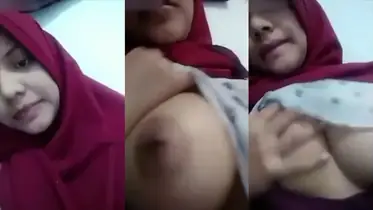 Bokep Jilbab Merah Ukhti Binal Pamer Dada Montok poster